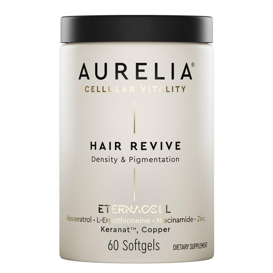AURELIA Hair Revive bottle on a clean vanity for daily hair support.