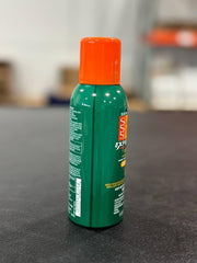 Mist from AVON Bug Guard Expedition on sunlit skin during outdoor activity.