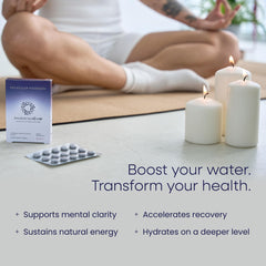 Person using hydration tablets in a focused studio setup