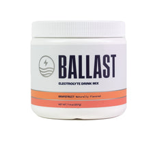 Ballast grapefruit electrolytes powder bottle for quick hydration during workouts.