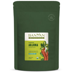 Banyan Botanicals Arjuna Bark Powder jar label shows organic, non-GMO heart support.