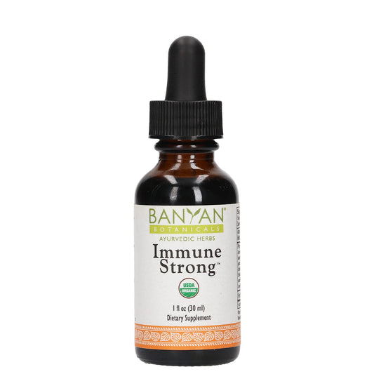 Banyan Botanicals Immune Strong bottle ready for daily use in a bright kitchen