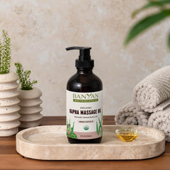 Banyan Botanicals Kapha Oil in winter warmth, ideal for comforting self-massage.