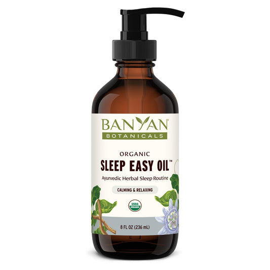 Banyan Botanicals Sleep Easy Oil bottle for soothing self-massage at night.