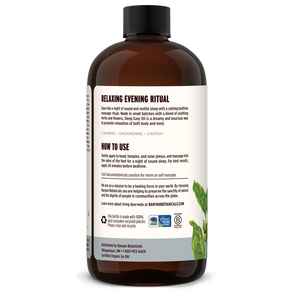 Banyan Botanicals Sleep Easy Oil packaging beside natural wood surface