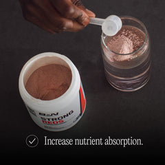 Bare Performance Nutrition Strong Reds powder dispersing in liquid for natural energy.