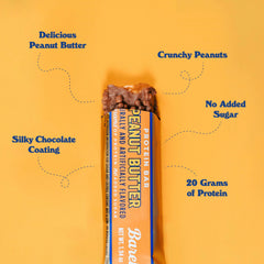 Barebells milk chocolate coating over peanut butter bar