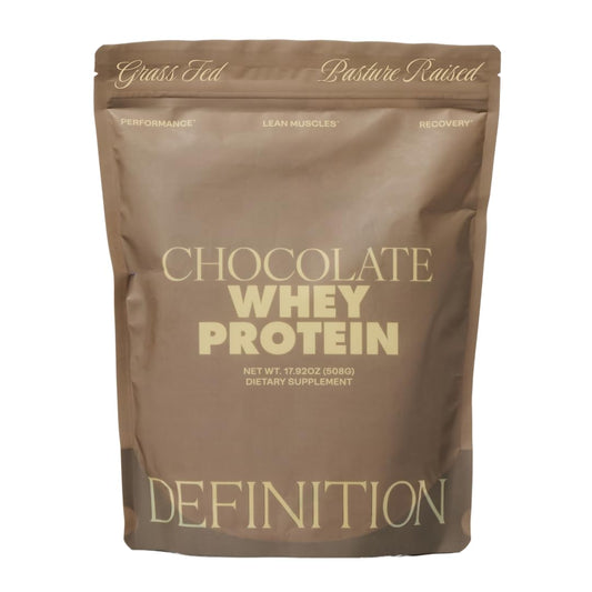 Barre Definition whey protein isolate chocolate tub shows premium quality for lean muscle support.