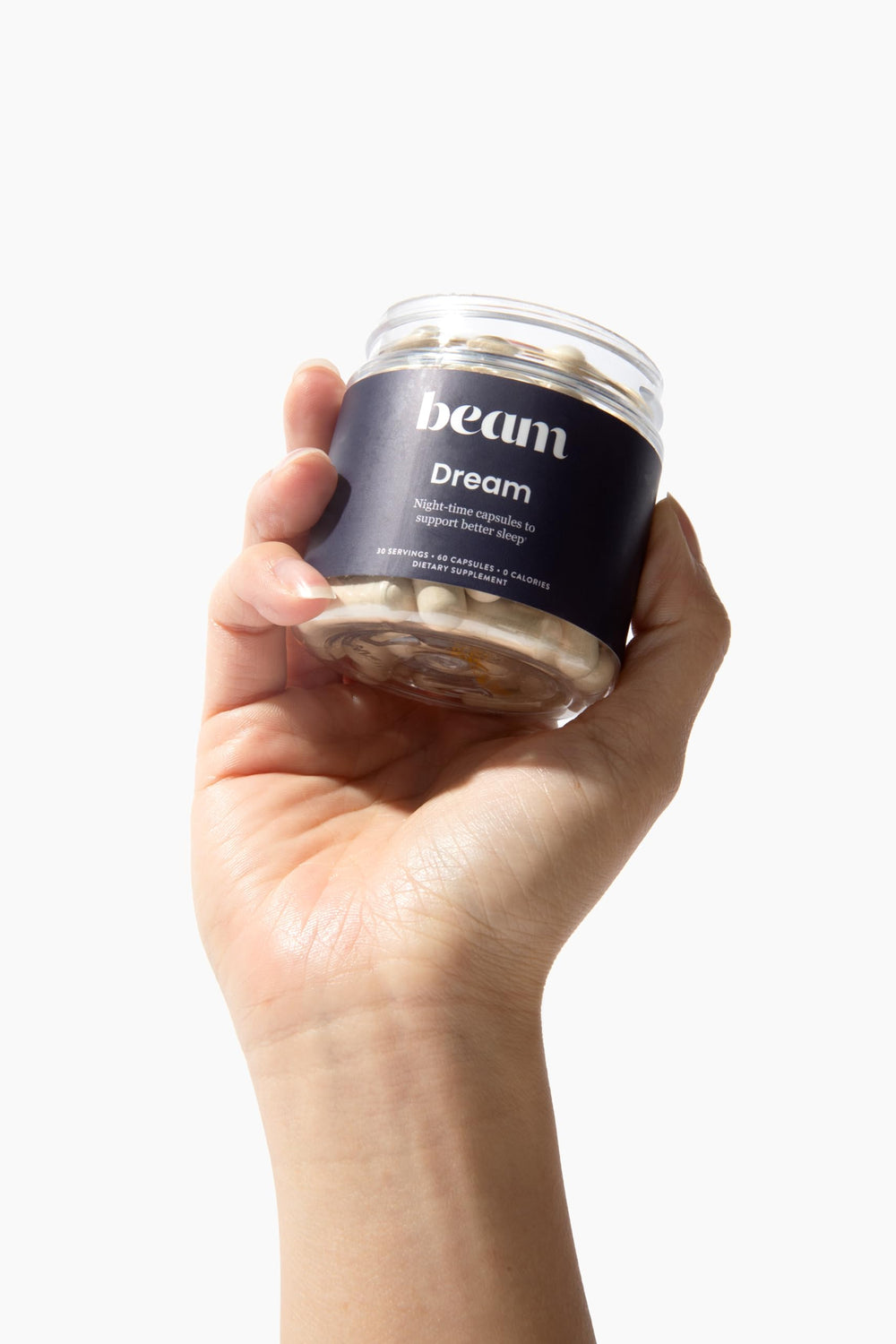 Beam Dream bottle beside alarm clock signals nighttime routine