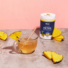 Bella All Natural Extreme Detox Pineapple glass with liquid conveys tropical refreshment and wellness