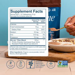 Bio.me Daily Prebiotic Fiber Powder Chocolate glass shows a ready-to-drink fiber beverage.