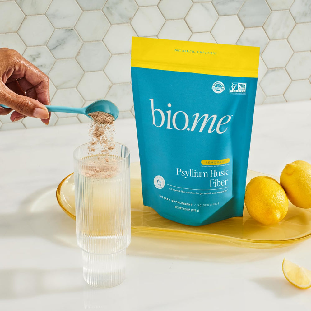 Bio.me Psyllium Husk Powder kitchen setup with non-GMO label visible.