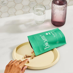 Bio.me Synbiotic 3-in-1 health-kitchen scene suggesting everyday wellbeing