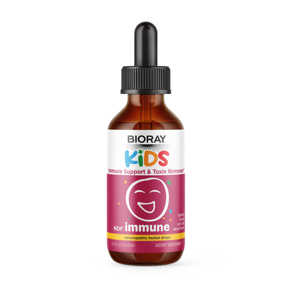 BIORAY Kids NDF Immune Blueberry bottle pour showing the product in a kid-friendly form.