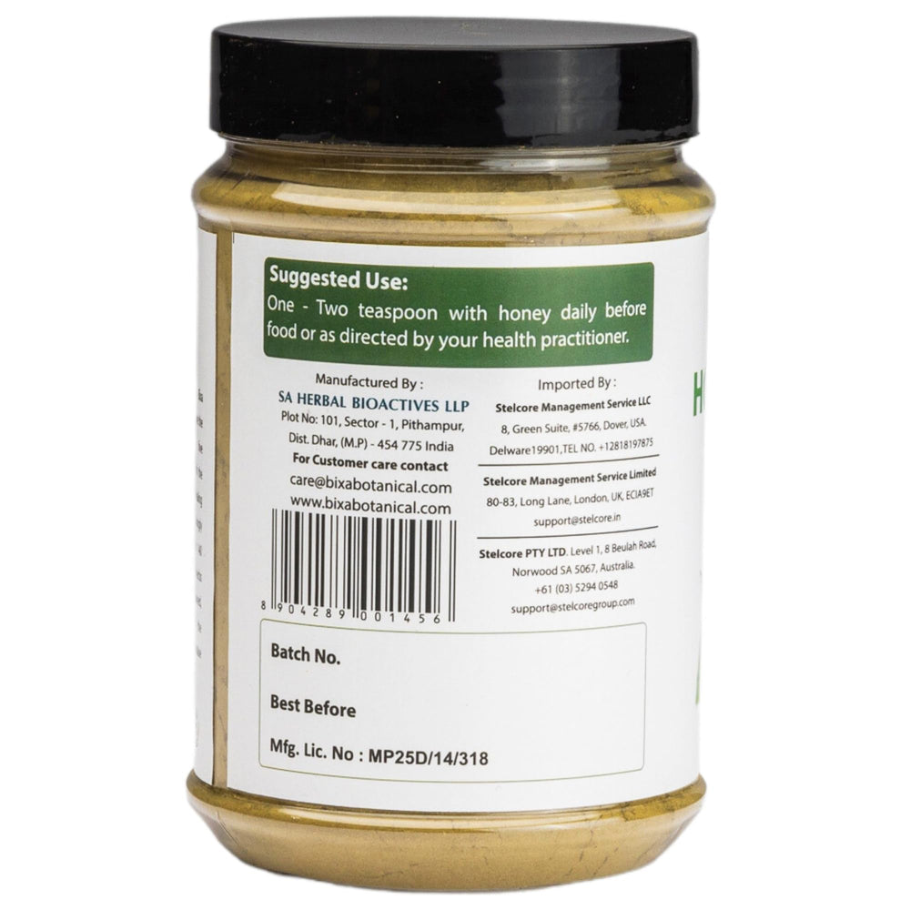Bixa Botanical Tulsi powder with scoop for precise measurement