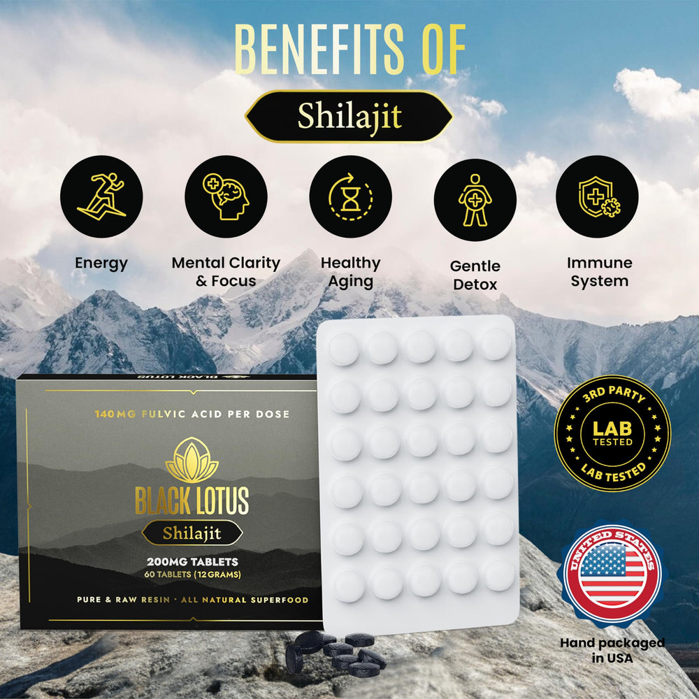 Closeup of Black Lotus Shilajit tablets shows tablet texture and compact form.