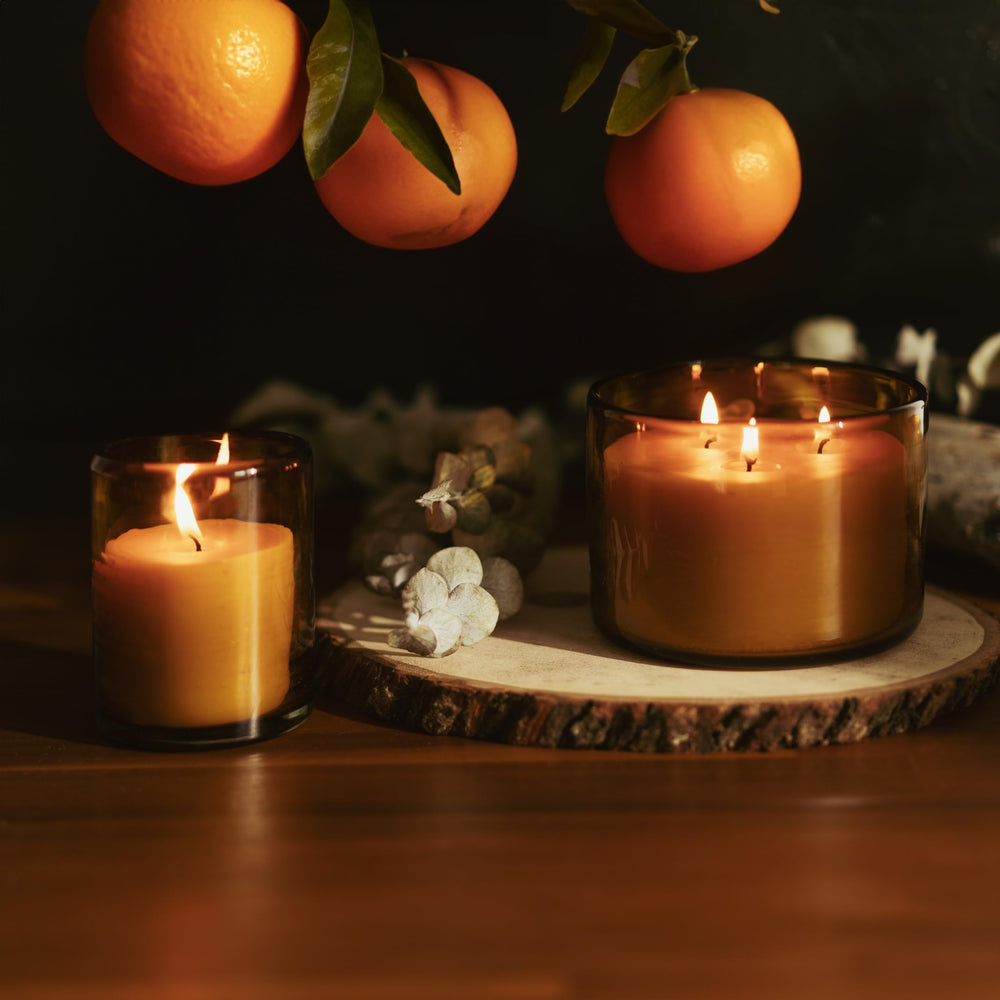 Bluecorn Beeswax candle lighting a dining room for a warm mood.