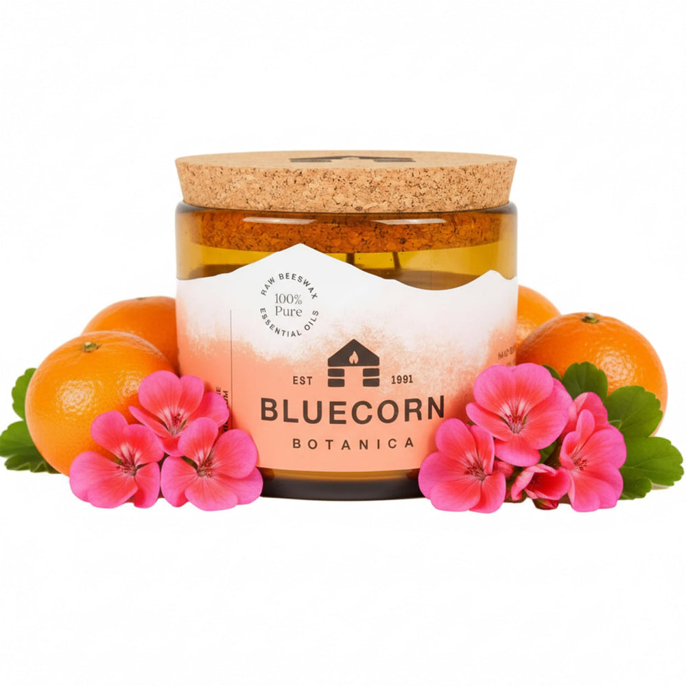 Bluecorn Beeswax Large 3-Wick Candle in amber glass offering warm, clean light with tangerine geranium scent.