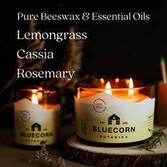 Warm golden glow from Bluecorn 3-wick candle enriching the room