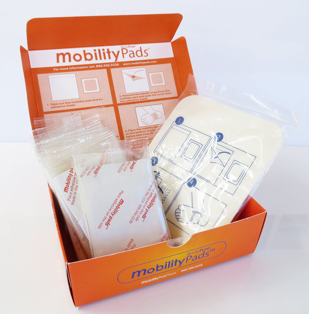 BodyPure foot patch worn during rest suggests eased fatigue and relaxation.
