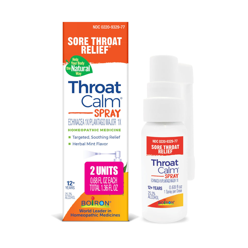 Boiron ThroatCalm spray bottle delivering targeted throat relief with a minty scent.