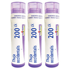 Boiron Thuja Occidentalis 200ck tubes on desk, ready for wart relief.