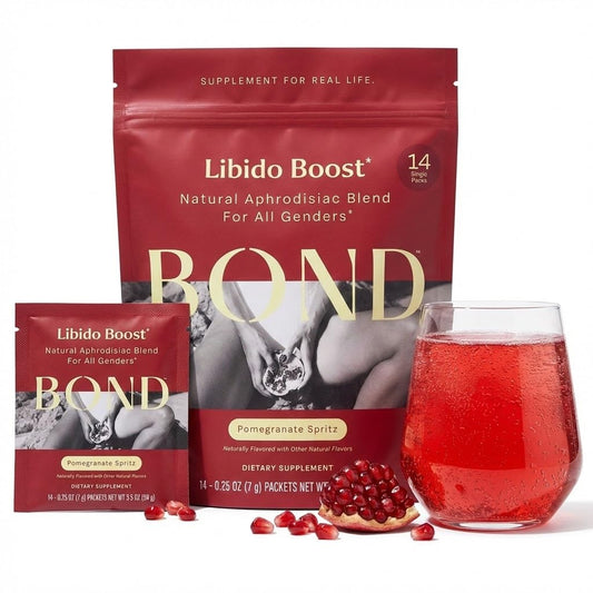 BOND Libido Booster effervescent sachet dissolving in water for a refreshing pomegranate drink