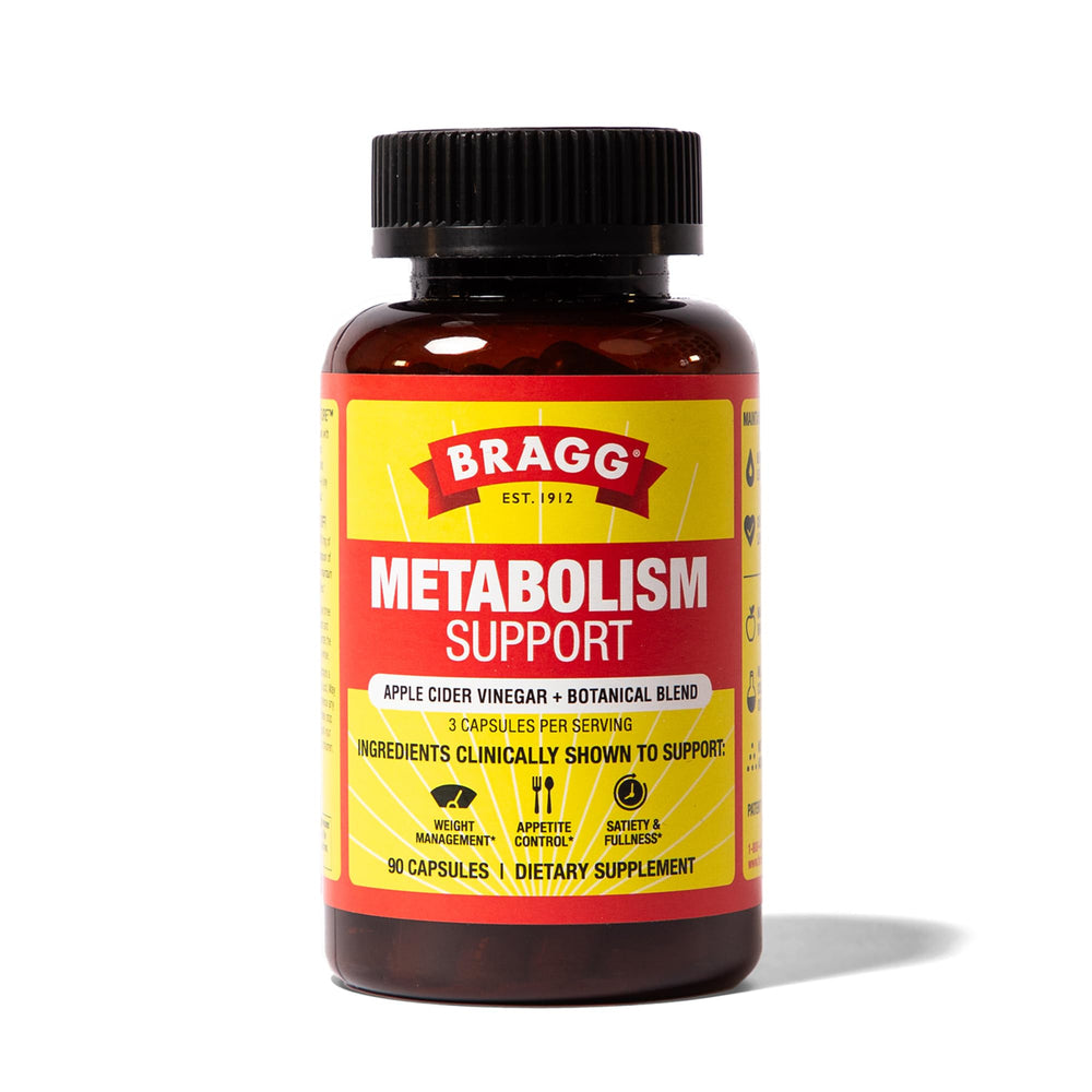 Bragg Metabolism Support bottle closeup shows capsule formula for daily wellness.