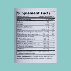 BrainChild Nutritionals IntestiMend dosing spoon measuring 1 oz for daily intake.