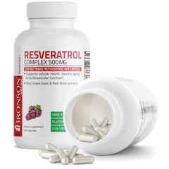 Capsules being poured from Bronson Resveratrol 500mg bottle into a hand.