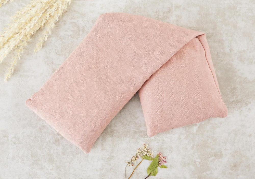 Pink Bucky wrap around neck and shoulders with contoured buckwheat filling