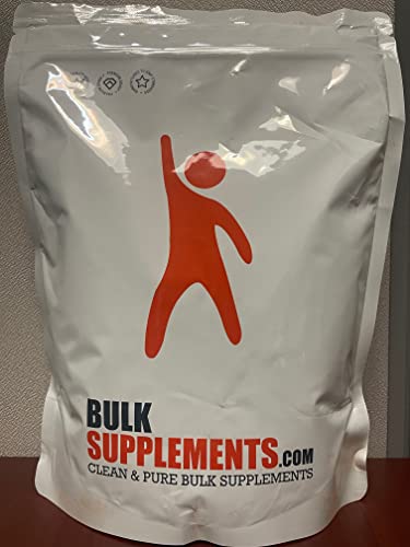 BulkSupplements Papaya Powder spoon dipping into beverage for flavor boost