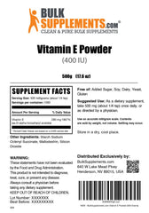 BulkSupplements Vitamin E 400 IU powder added to a shake in a glass.