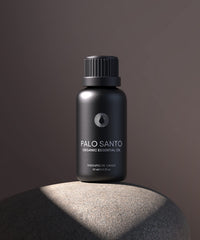 Bursera Palo Santo oil close-up emphasizing natural purity and clarity.