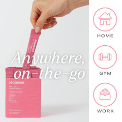 Bottle close-up emphasizes vitamin C and zinc on the label for skincare benefits.