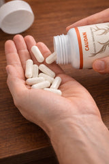 CAUDAN capsule closeup emphasizing easy swallowing and routine compatibility