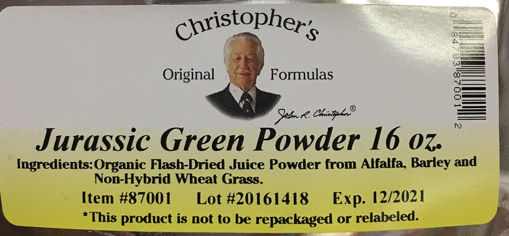 Christopher's Original Formulas Jurassic Green Powder scoop beside glass for easy mixing.