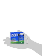 Close-up of a Claritin tablet showing the 10 mg loratadine dose.