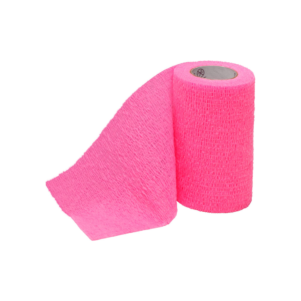 Coban pink non-latex self-adherent wrap close-up showing secure, clip-free application