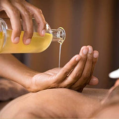 Cocojojo Sweet Almond and Jojoba oils nourish skin during massage.