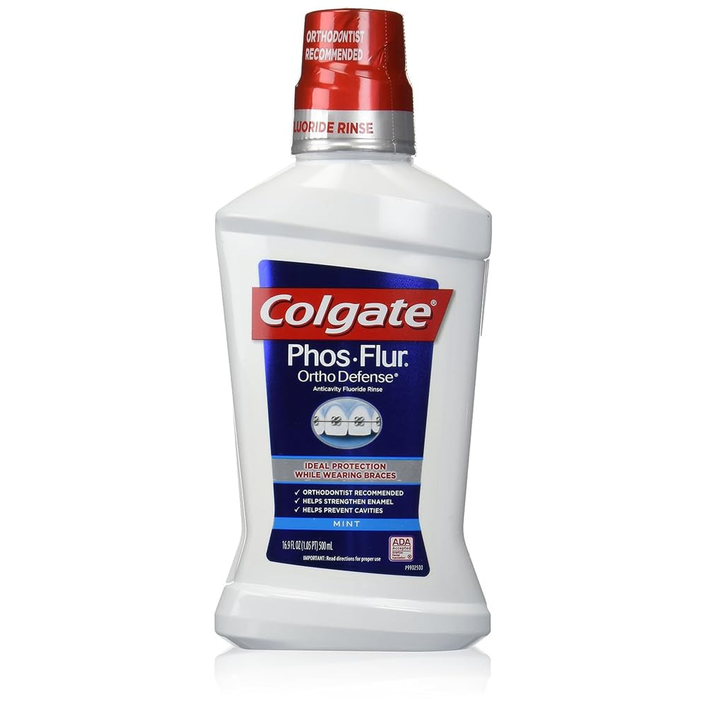 Colgate Phos-Flur Mint rinse bottle front view, three-pack for home use.