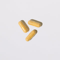 Colorsmith Biotin Hair Multivitamins bottle on countertop ready for daily routine.