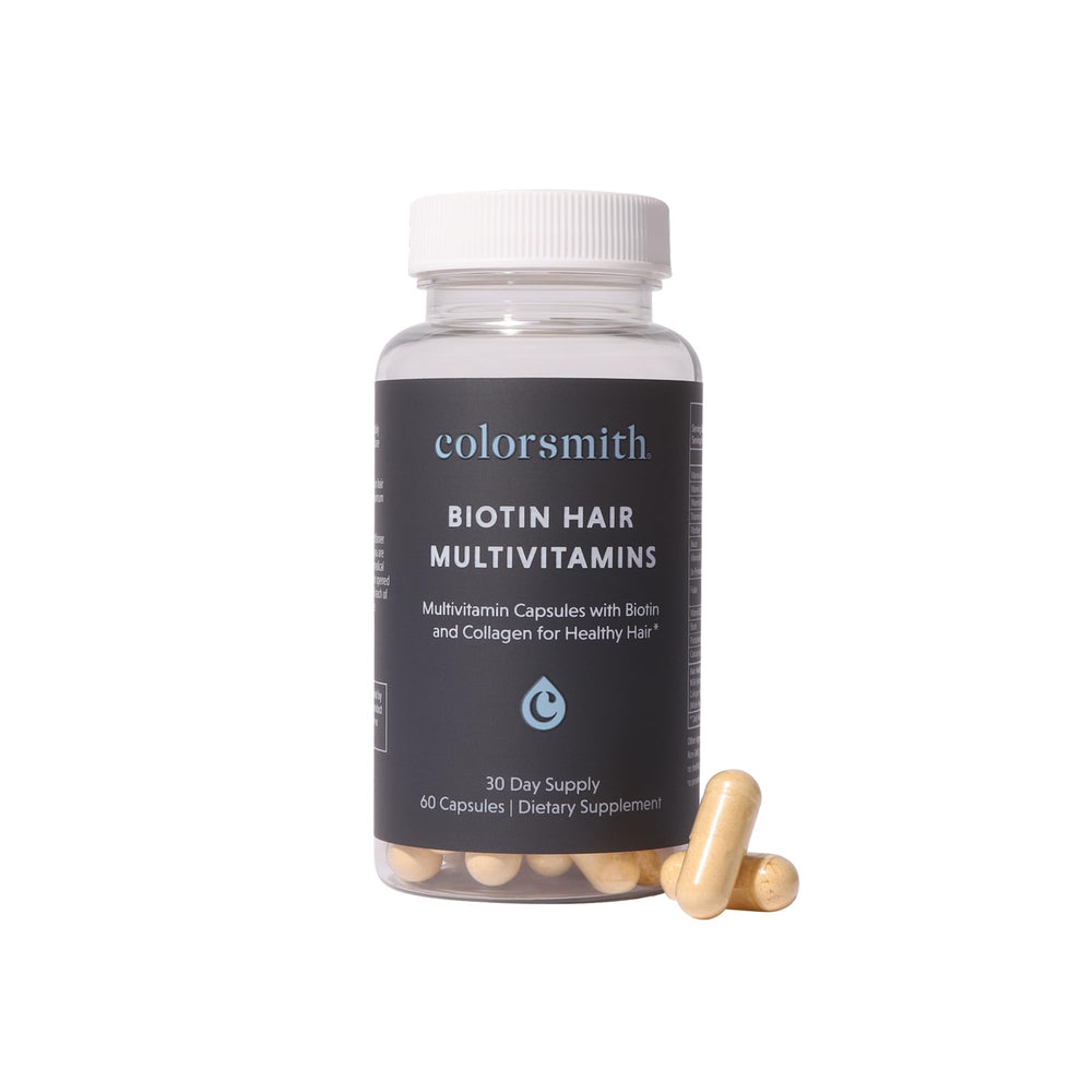 Colorsmith Biotin Hair Multivitamins bottle promotes daily hair wellness on a clean surface.