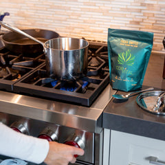 Cor-Vital detox coffee brew in a glass, ready to prepare a gentle cleanse.