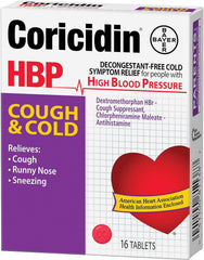 Coricidin HBP tablet in hand to illustrate simple, BP-conscious dosing.