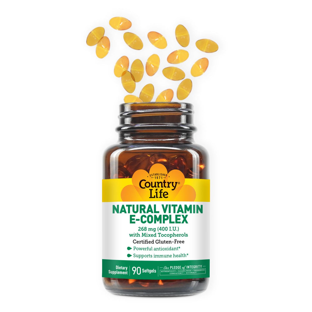 Country Life Vitamin E-Complex softgels arranged for skin health focus
