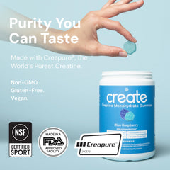 Create Creatine Monohydrate Gummies held in hand for on-the-go training.