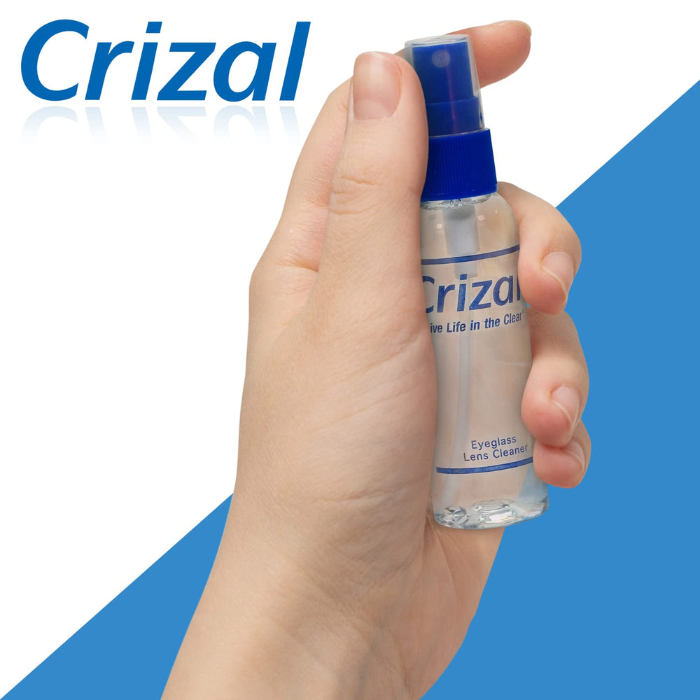 Hands applying Crizal cleaner to AR-coated lens surfaces