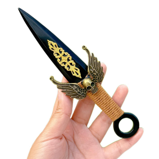 Crystland obsidian dagger sculpture on altar display highlights sleek black form.