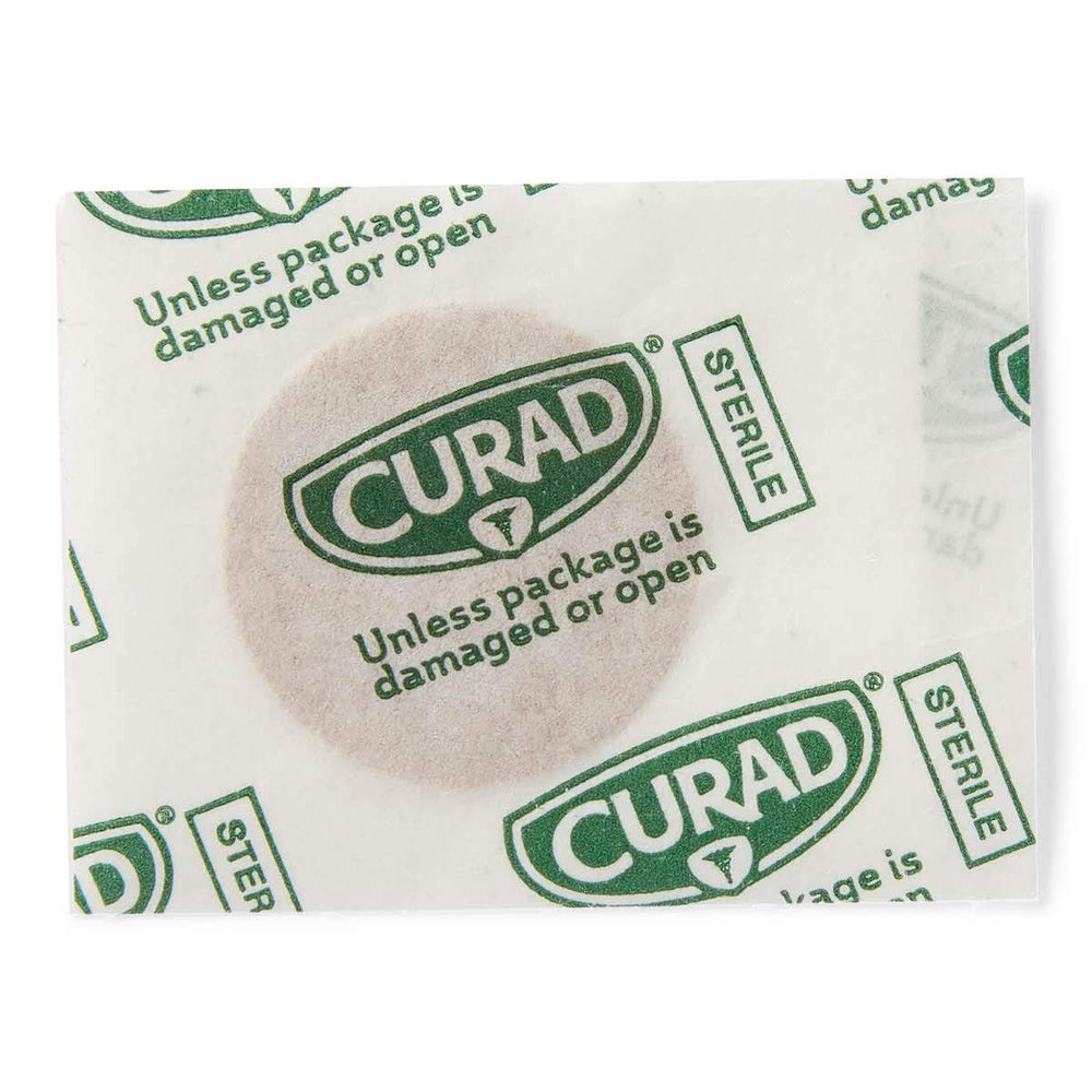 Curad adhesive bandage on skin delivering durable protection during daily activities.